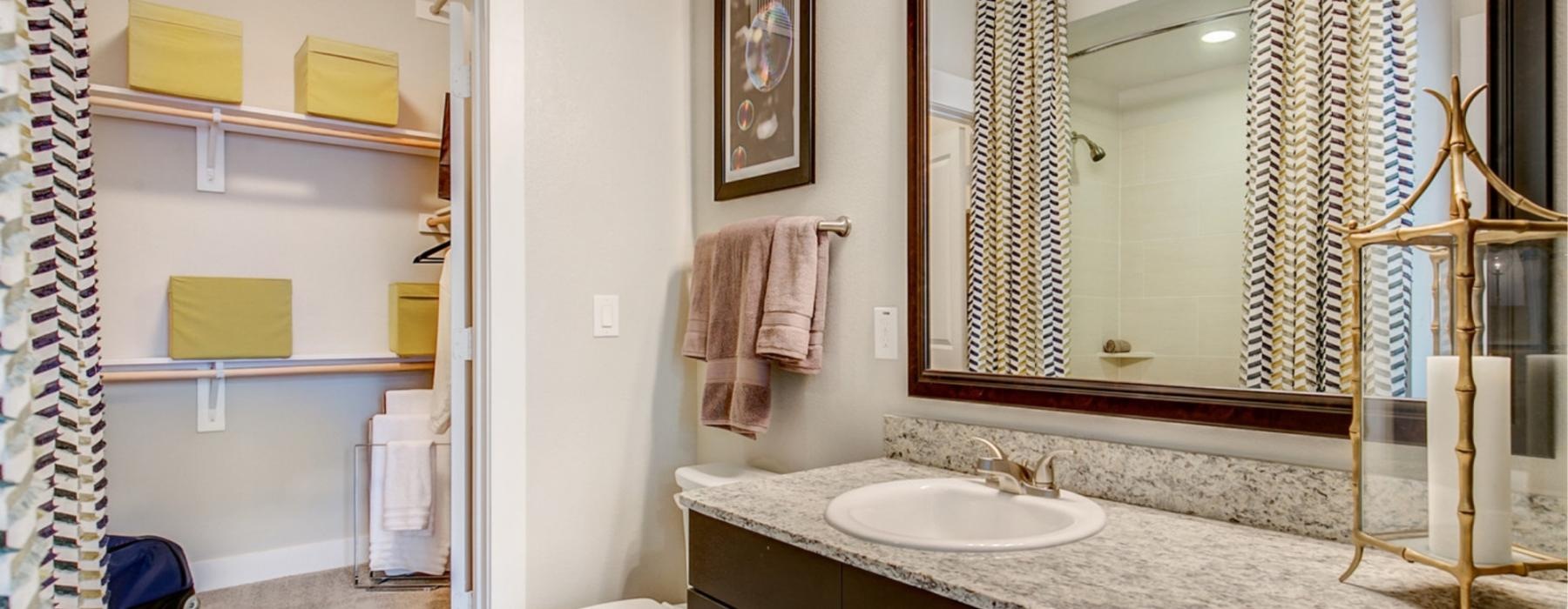 a bathroom with a large mirror
